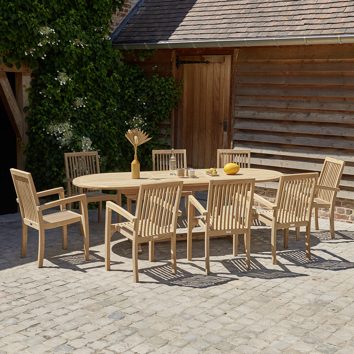 Berah Getah MALTE fauteuil jardin teck massif empilable