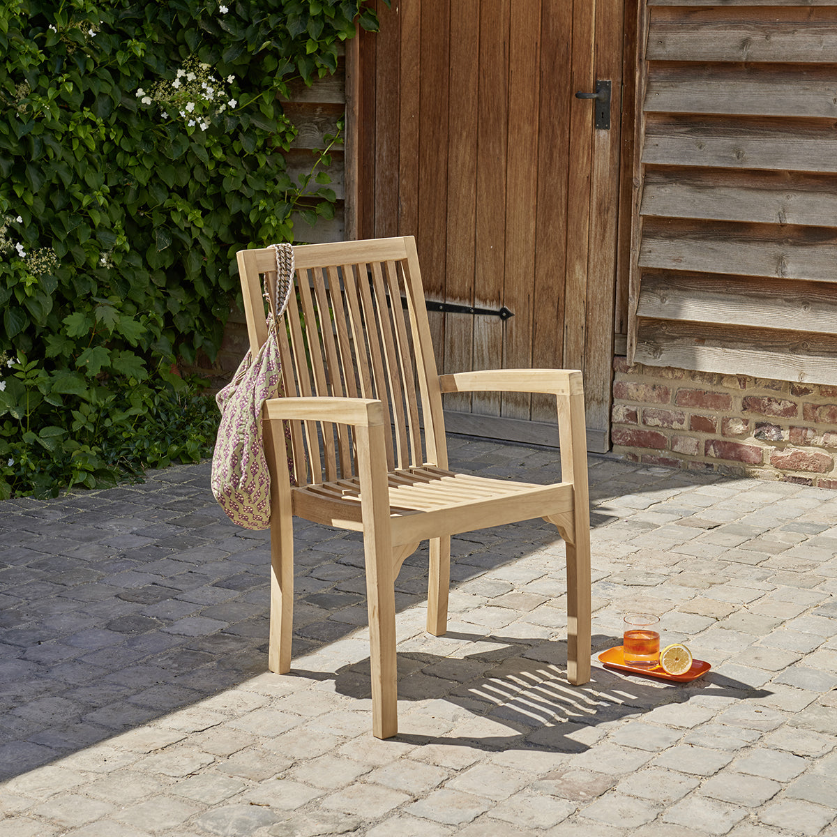 Berah Getah MALTE fauteuil jardin teck massif empilable